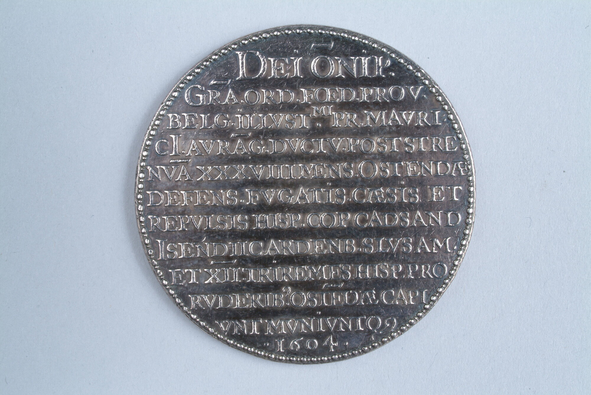 A.0023(070); Penning geslagen op de overgave van Oostende, 1604; penning