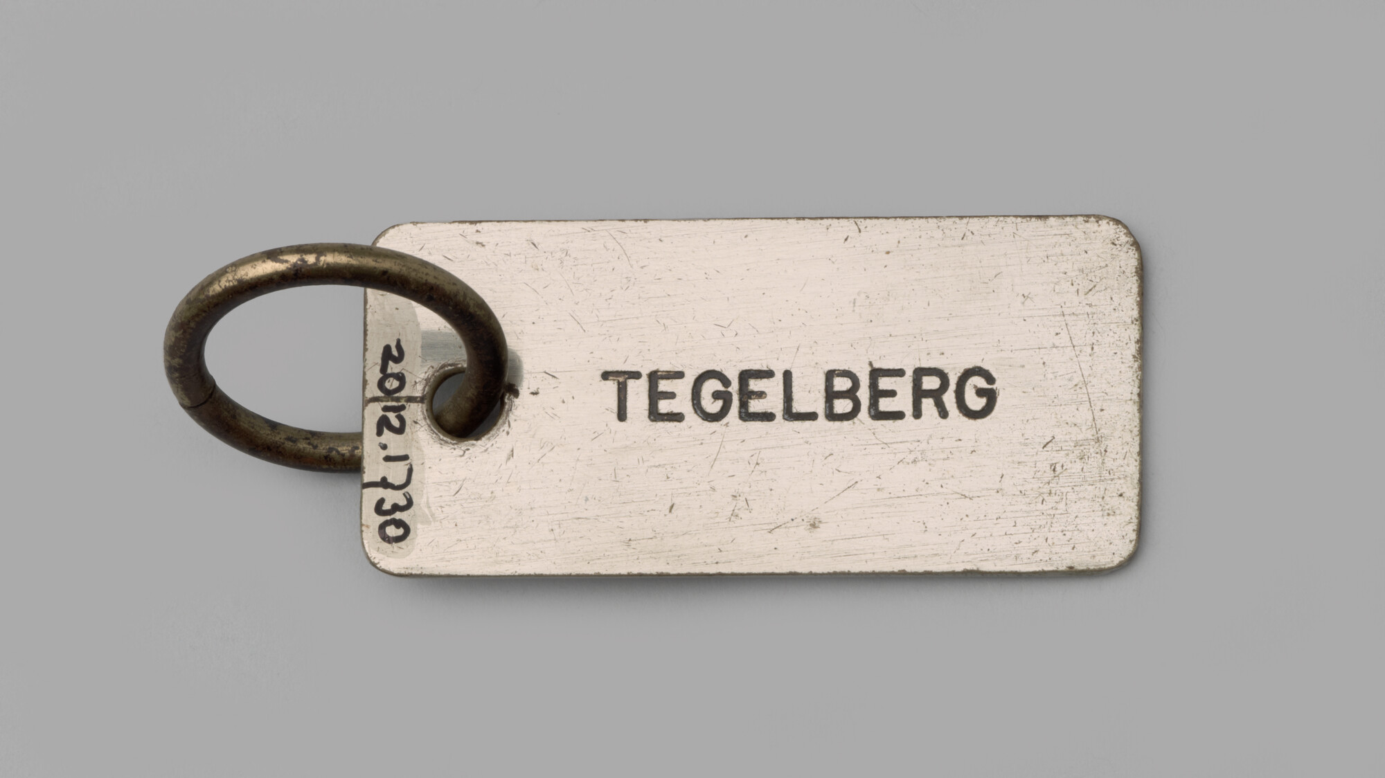 2012.1730; Sleutelhanger van het schip Tegelberg; sleutelhanger