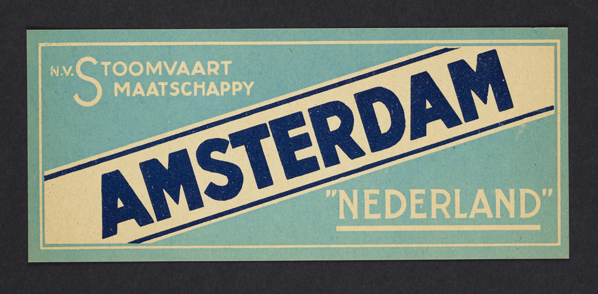 2020.0018; Kofferlabel van de Stoomvaart Maatschappij "Nederland"; kofferlabel