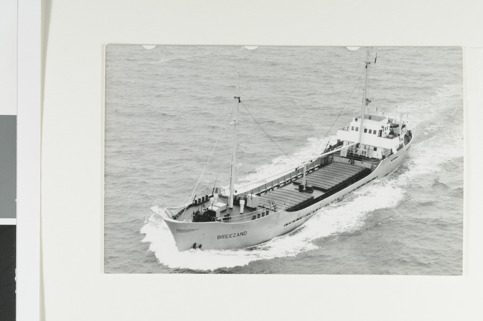 S.6408(0889); Luchtfoto van de coaster ms. 'Breezand' van P.A. van Es & Co; foto