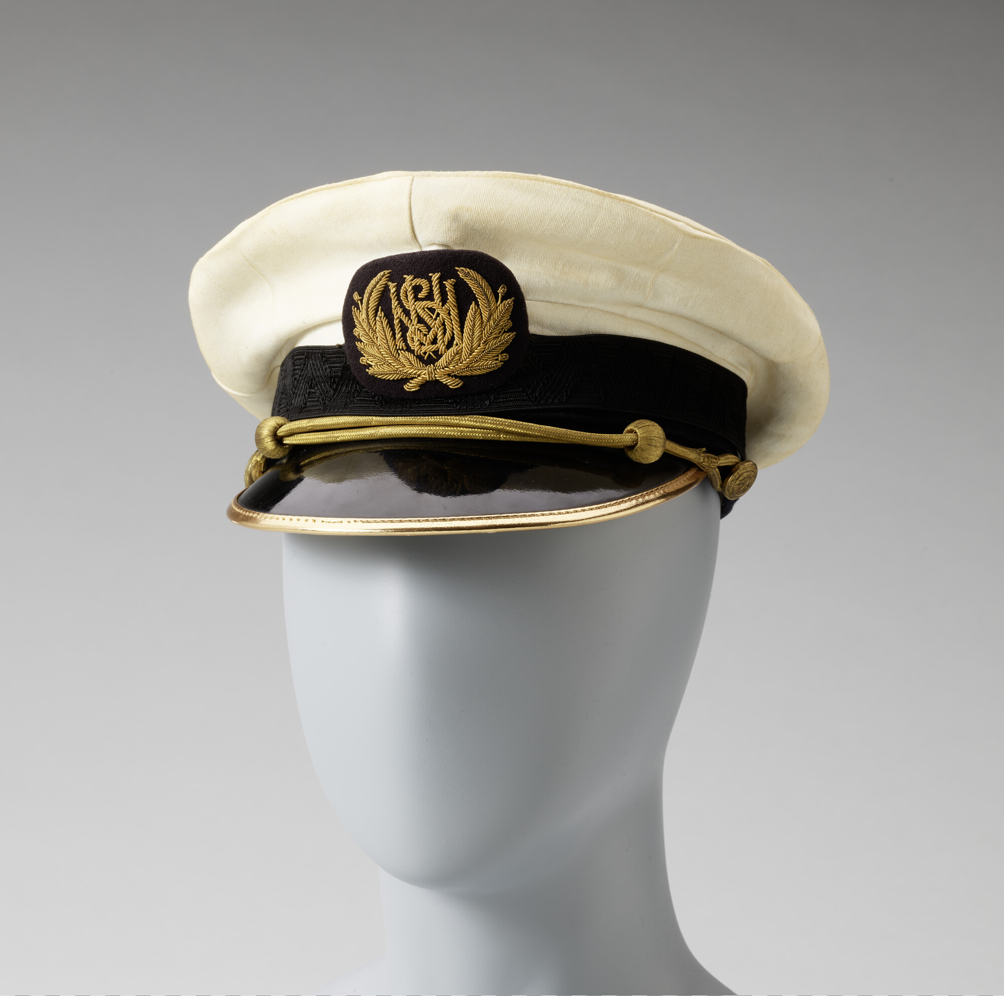 S.5761(28); Uniformpet behorend tot het uniform van een gezagvoerder van de SMN; uniform