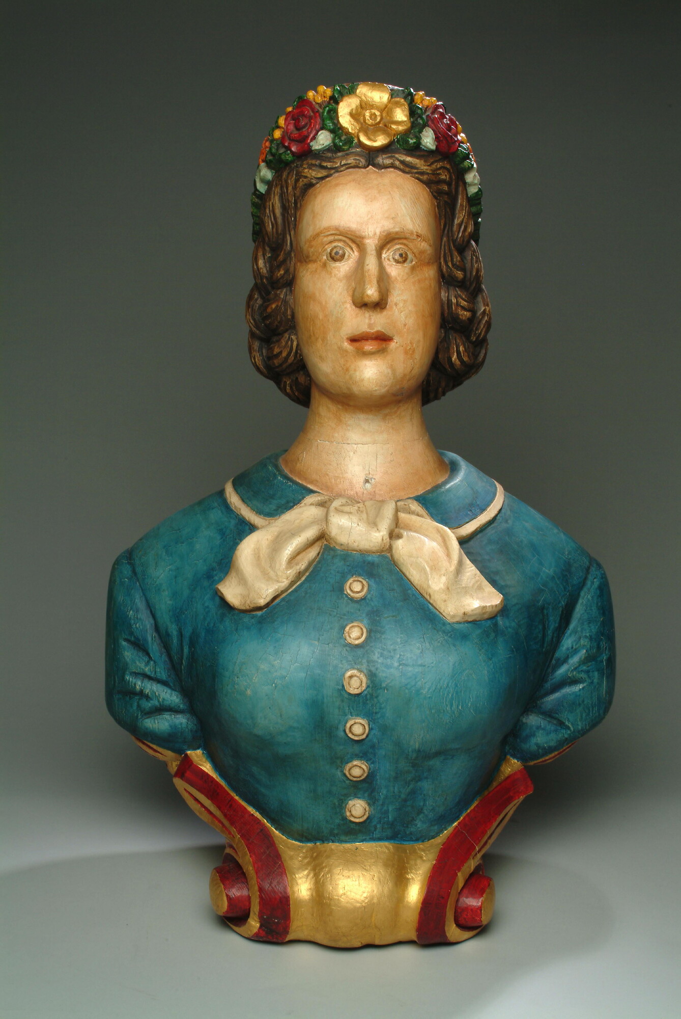A.0125(17)a [nr 0004]; Schegbeeld, voorstellend een vrouw met bonnet; boegversiering