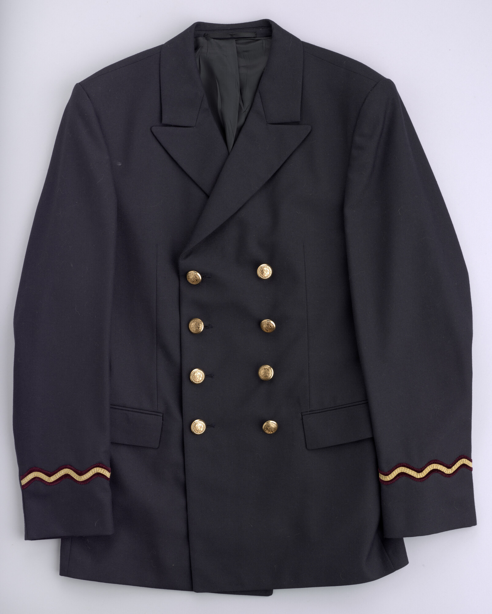 2012.0338-1; Uniformjas behorende bij het uniform van Radio Holland van marconist 2de klasse H. Parmentier; uniform