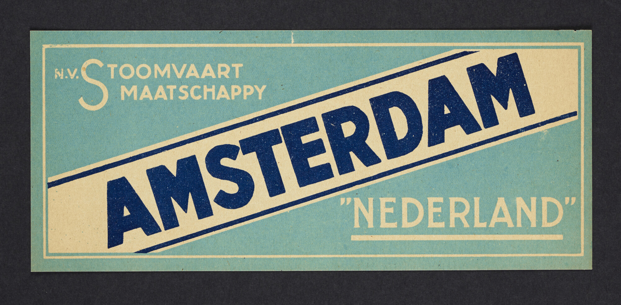 2020.0020; Kofferlabel van de Stoomvaart Maatschappij "Nederland"; kofferlabel