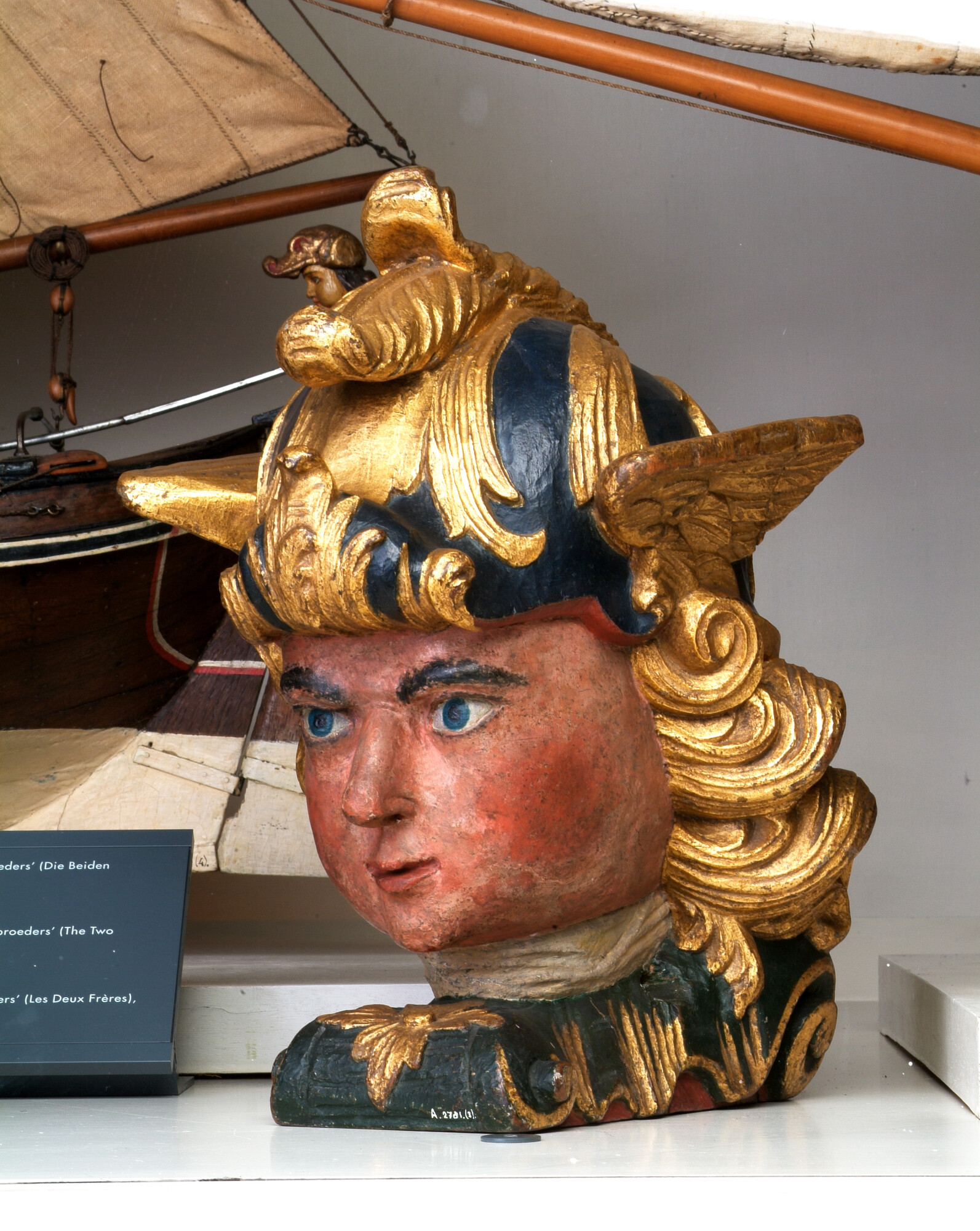 A.2781(03); Roerkop van Mercurius, een mannenhoofd met een gevleugelde helm; roerversiering